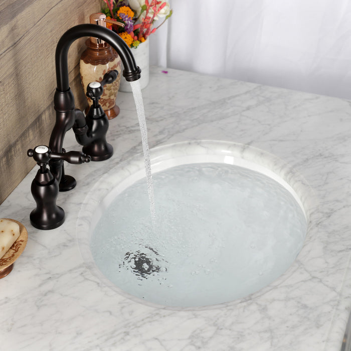 Kingston Brass KS7995TAL Tudor Bridge Bathroom Faucet with Brass Pop-Up, Oil Rubbed Bronze